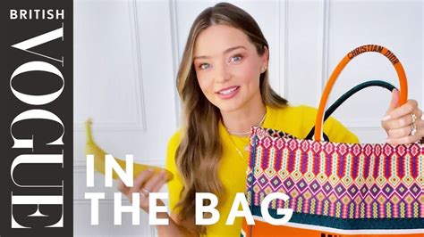 Watch Miranda Kerr Break Down Exactly What’s In Her Dior Bag